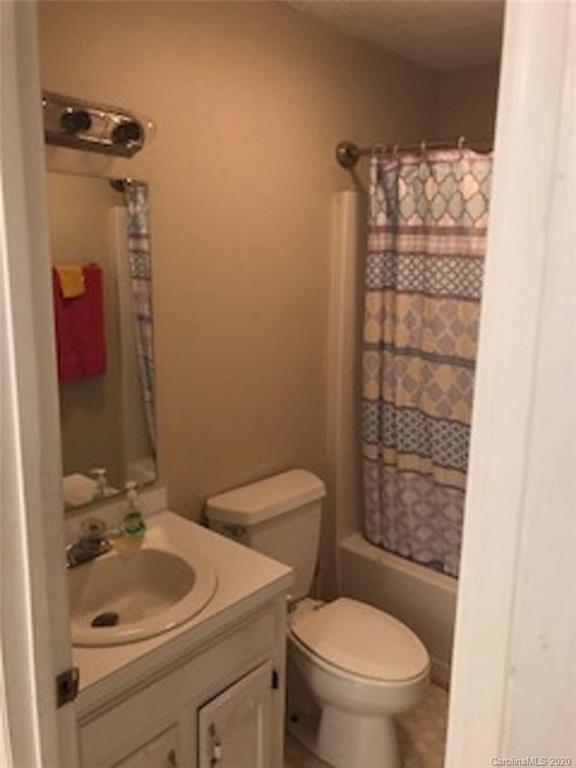 4525 Hickory Grove Road Sharon, SC 29742 - Photo 19 of 35 a bathroom with a sink toilet and shower
