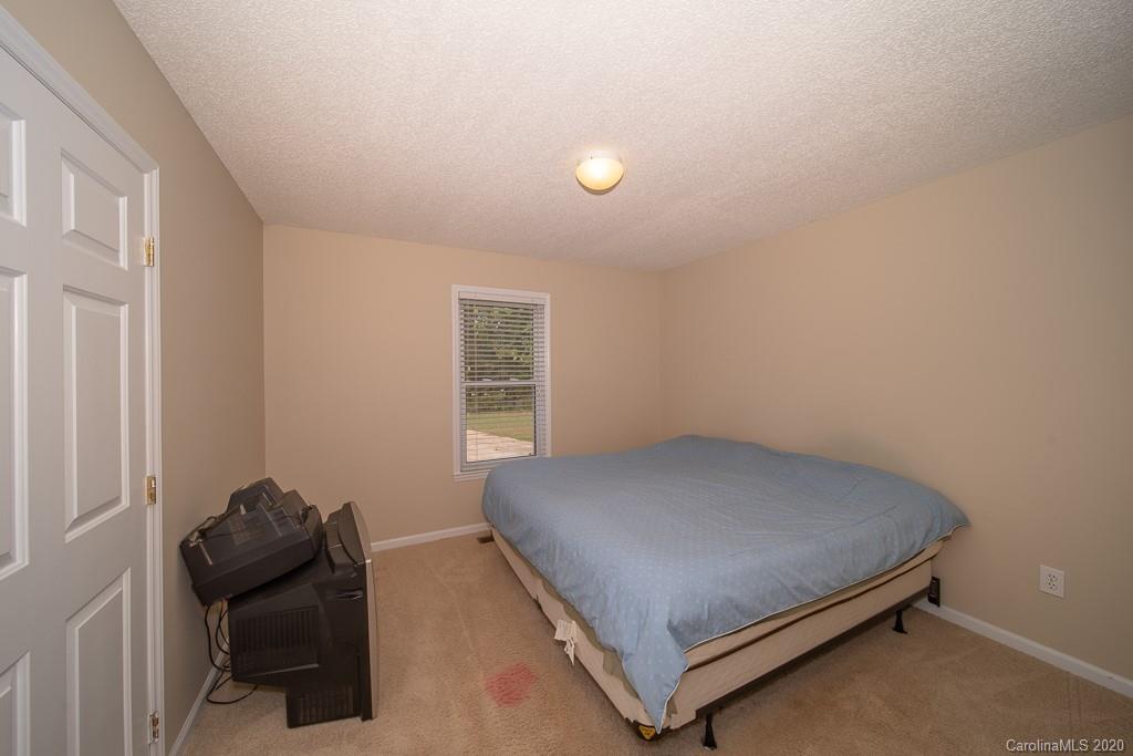 4525 Hickory Grove Road Sharon, SC 29742 - Photo 21 of 35 a bedroom with a bed and a window