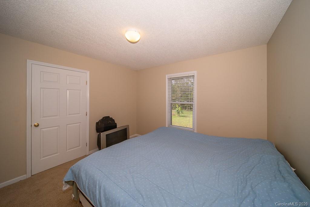 4525 Hickory Grove Road Sharon, SC 29742 - Photo 22 of 35 a bedroom with a bed and a window