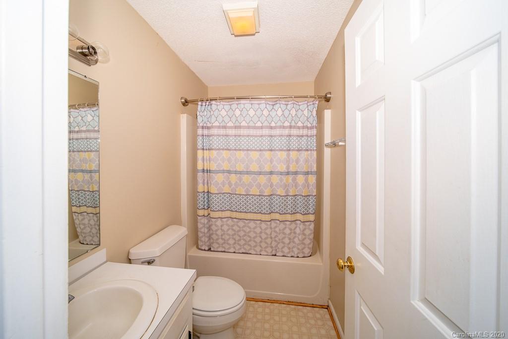 4525 Hickory Grove Road Sharon, SC 29742 - Photo 24 of 35 a white toilet sitting next to a bathroom sink