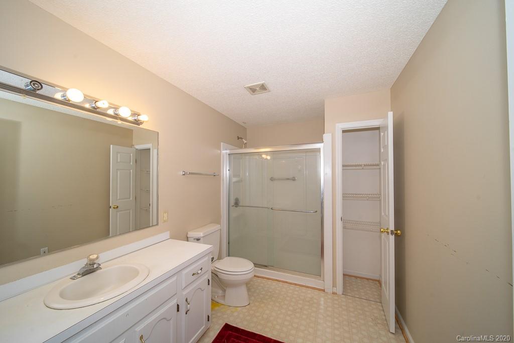 4525 Hickory Grove Road Sharon, SC 29742 - Photo 25 of 35 a bathroom with a sink a toilet and shower