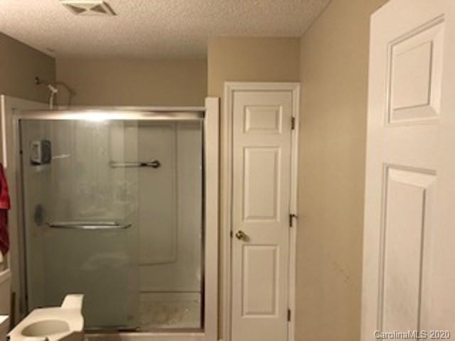 4525 Hickory Grove Road Sharon, SC 29742 - Photo 26 of 35 a bathroom with a shower and a toilet
