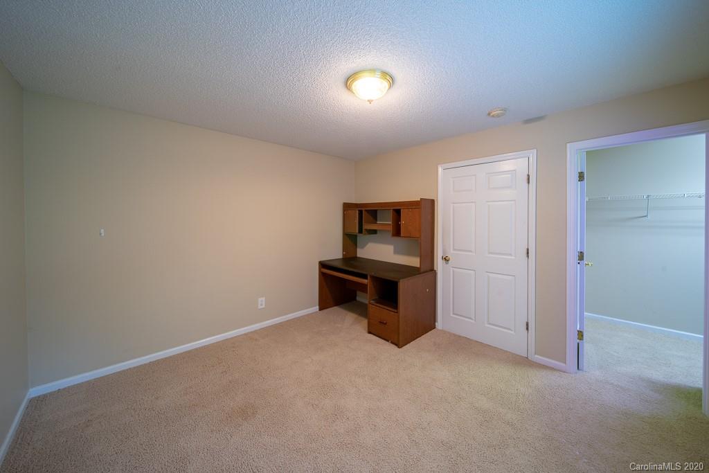 4525 Hickory Grove Road Sharon, SC 29742 - Photo 28 of 35 a view of kitchen and empty room with cabinet