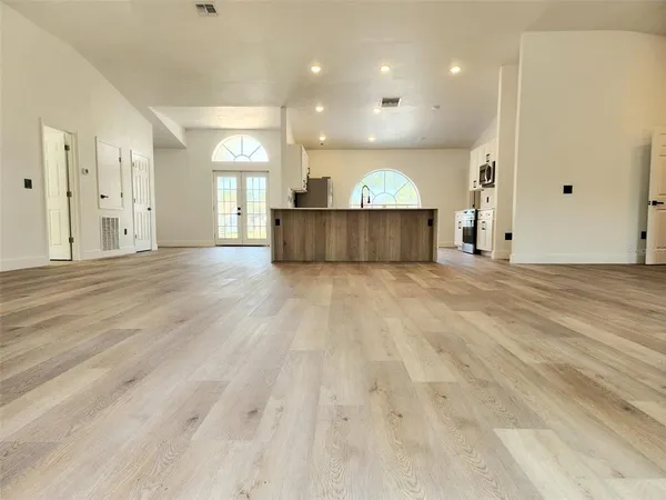 a view of a big room with wooden cabinet