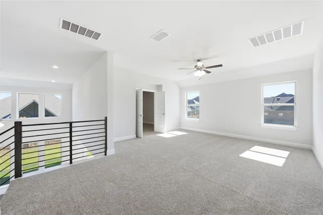 a view of a livingroom with a ceiling fan