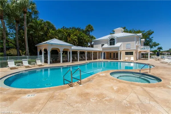 a view of a house with swimming pool
