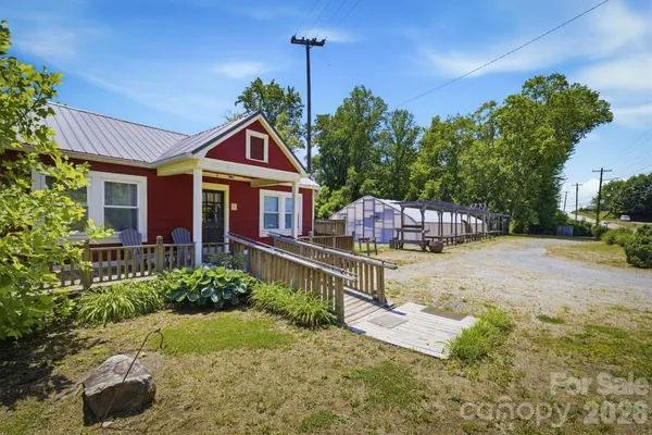 a house view with a garden space