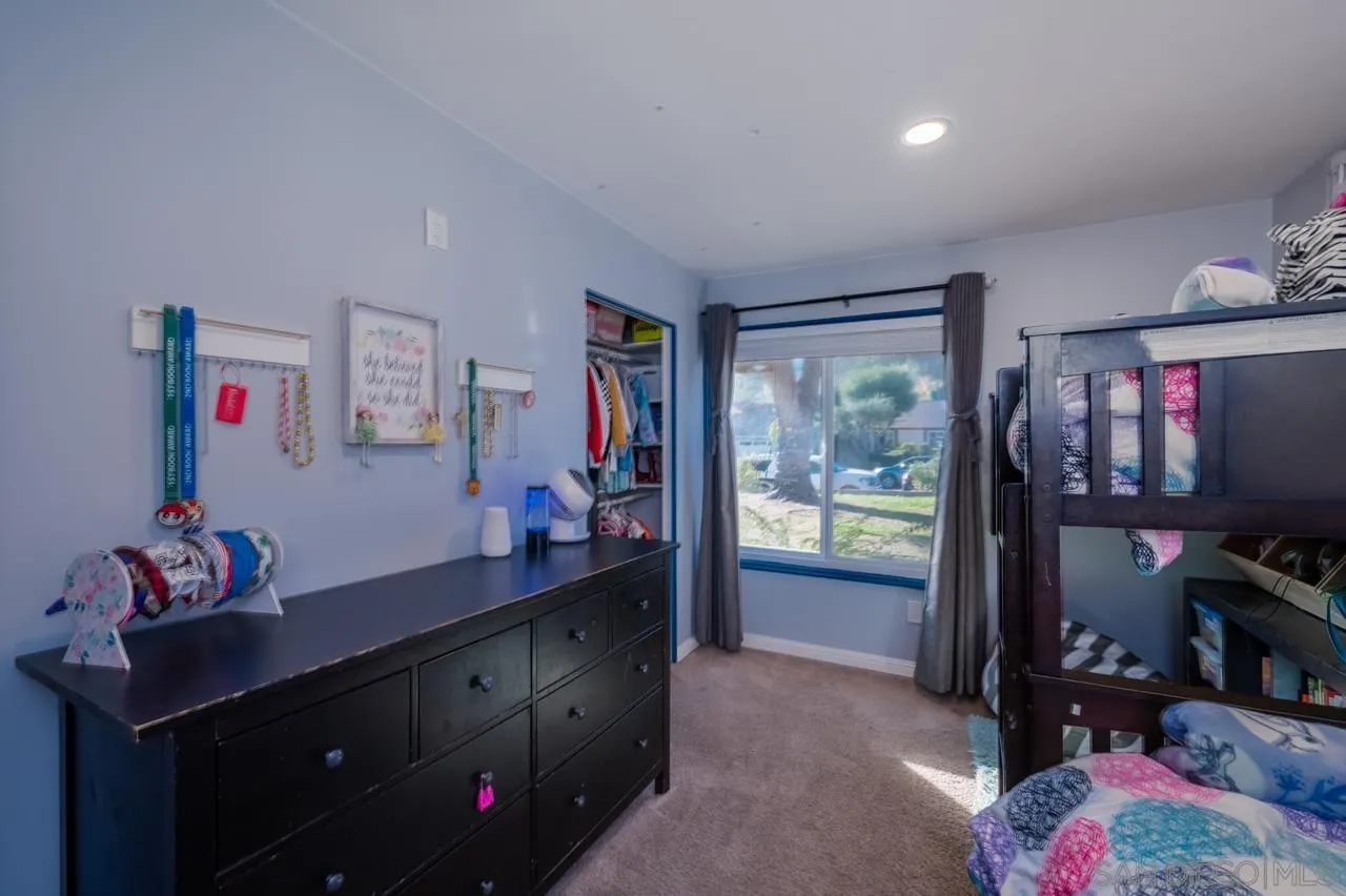 14027 Hermosillo Way Poway, CA 92064 - Photo 16 of 31 a kitchen with a sink and cabinets