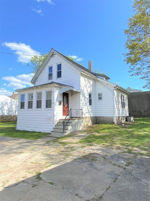 171 Snell Street Fall River, MA 02721 - Photo 1 of 34 a view of a house with a yard