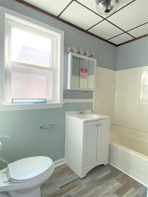 171 Snell Street Fall River, MA 02721 - Photo 14 of 34 a bathroom with a sink a toilet and bathtub