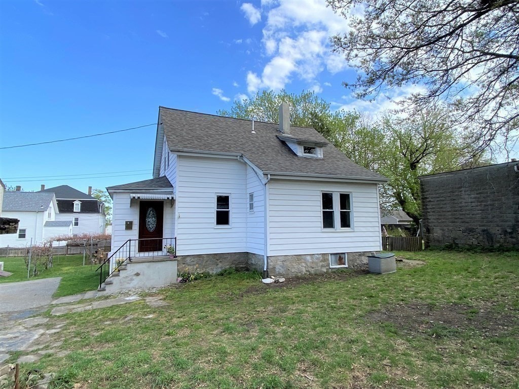 171 Snell Street Fall River, MA 02721 - Photo 2 of 34 a view of a house with a yard