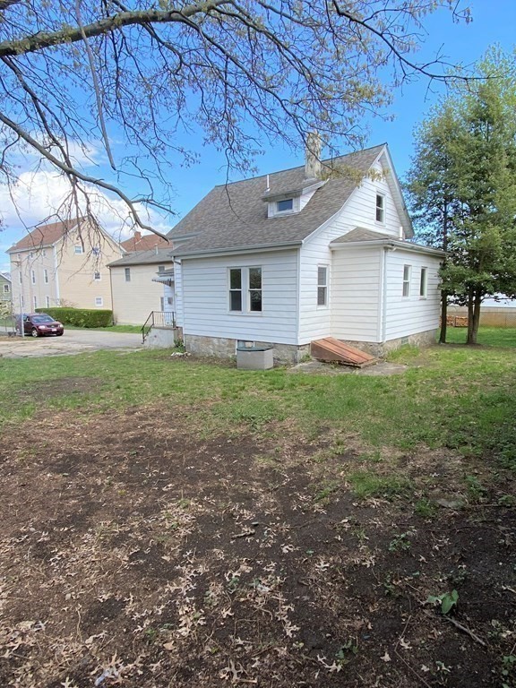 171 Snell Street Fall River, MA 02721 - Photo 3 of 34 a house view with a garden space