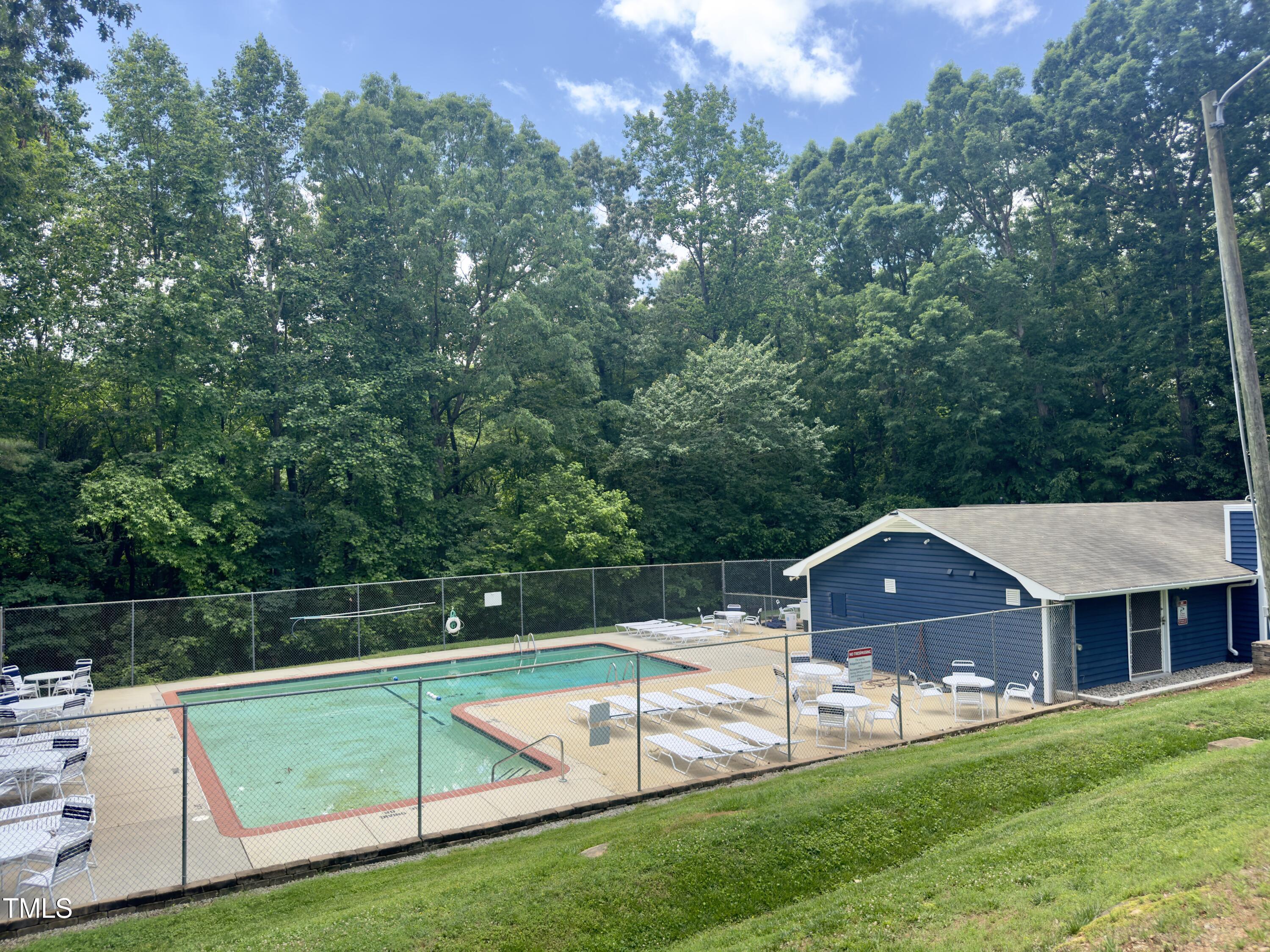 5767 Forest Lawn Court Raleigh, NC 27612 - Photo 14 of 17 a view of house with a yard