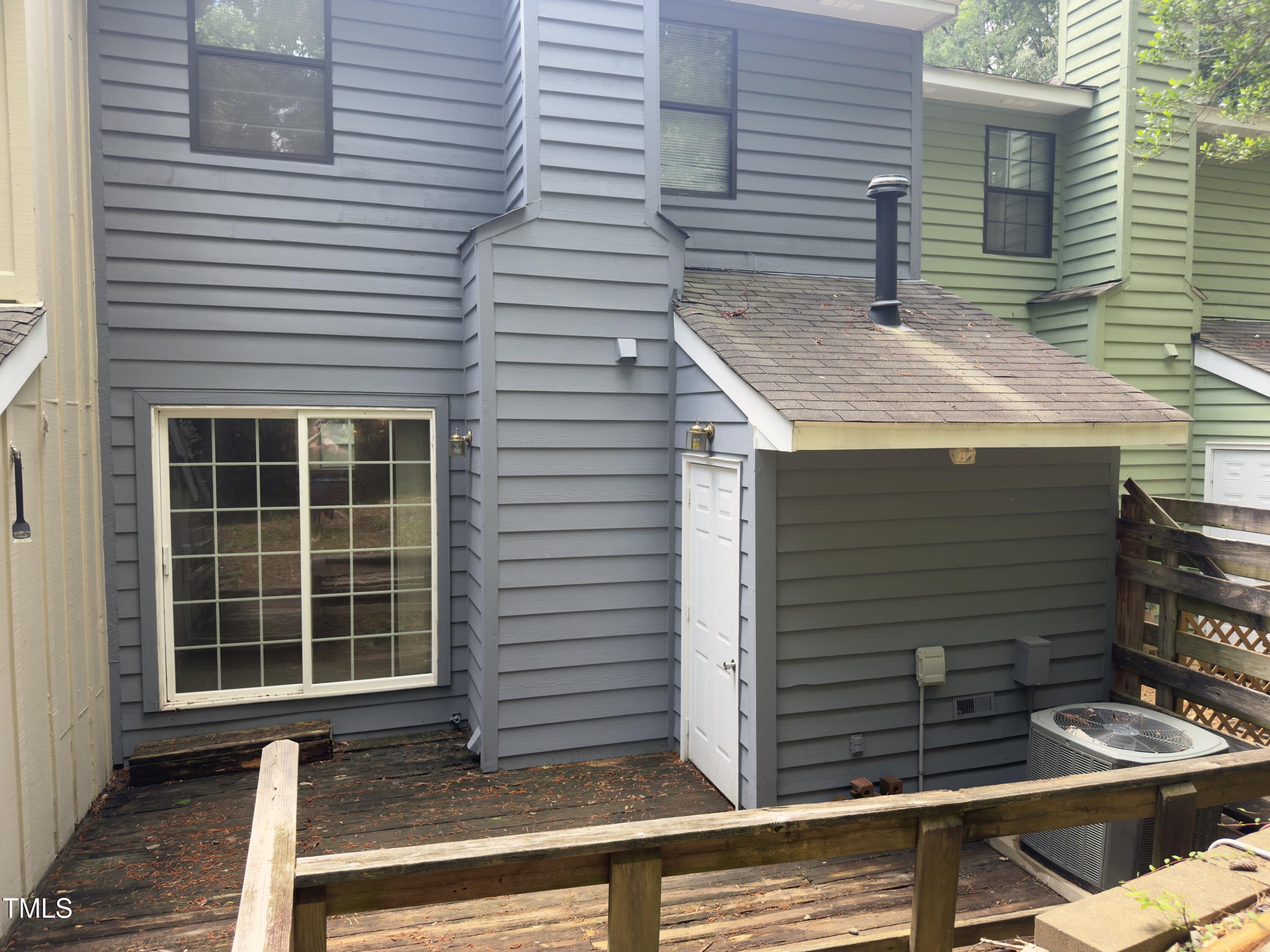 5767 Forest Lawn Court Raleigh, NC 27612 - Photo 10 of 17 a front view of a house with windows