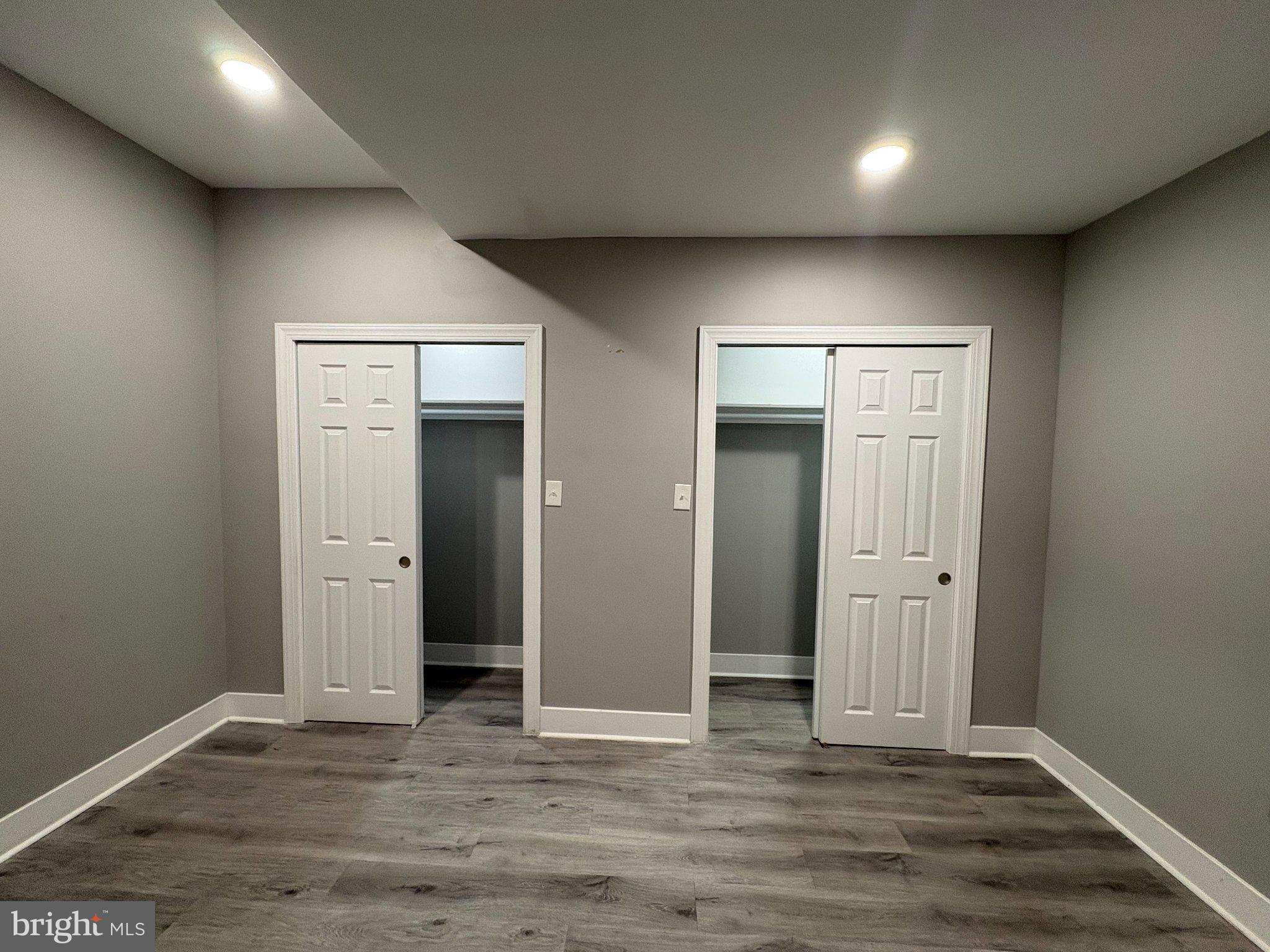 1813 South 23rd Street, Unit 2 Philadelphia, PA 19145 - Photo 9 of 20 an empty room with wooden floor & closet area