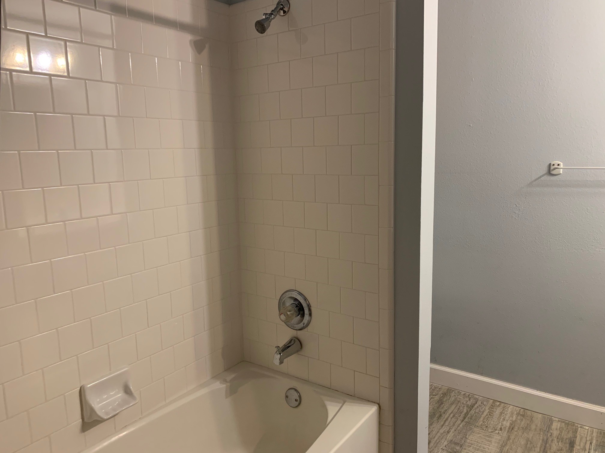 13605 Ralph Ritchie Road Manor, TX 78653 - Photo 17 of 19 Bathroom with baseboards and shower combination