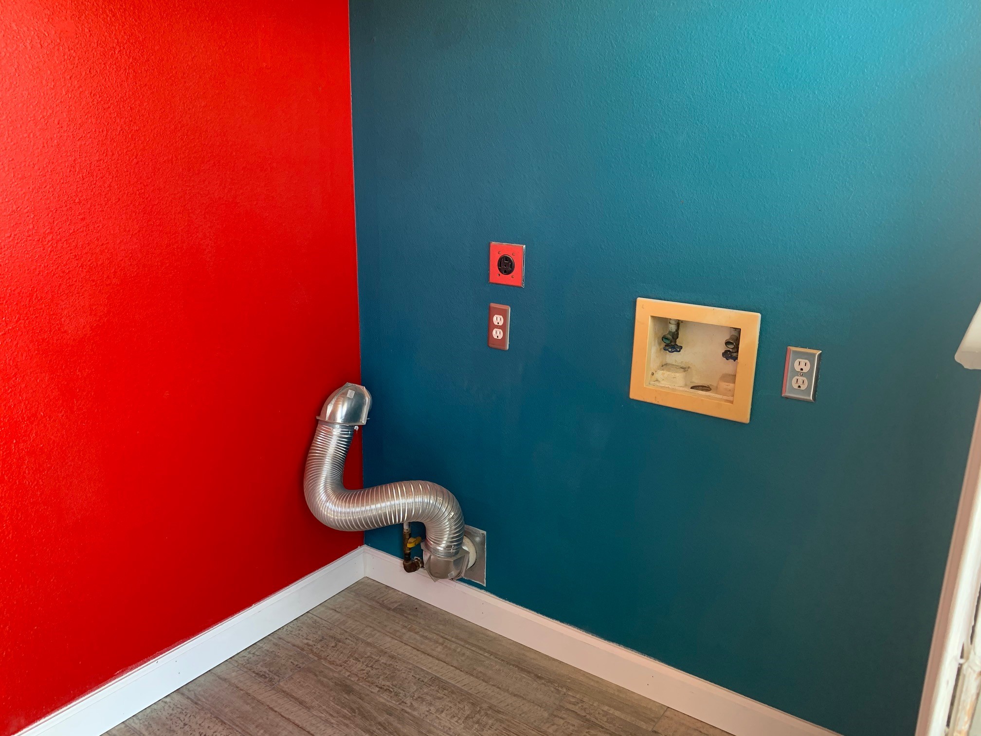 13605 Ralph Ritchie Road Manor, TX 78653 - Photo 19 of 19 Laundry area with wood finished floors, hookup for an electric dryer, and washer hookup