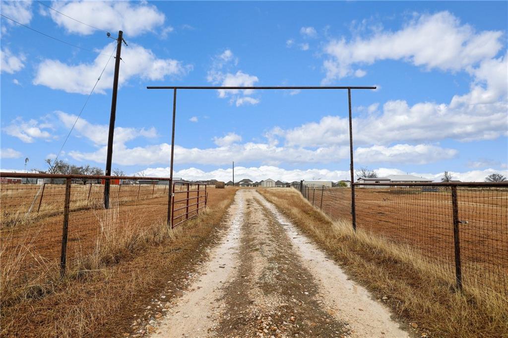 13605 Ralph Ritchie Road Manor, TX 78653 - Photo 3 of 19 View of street with a rural view