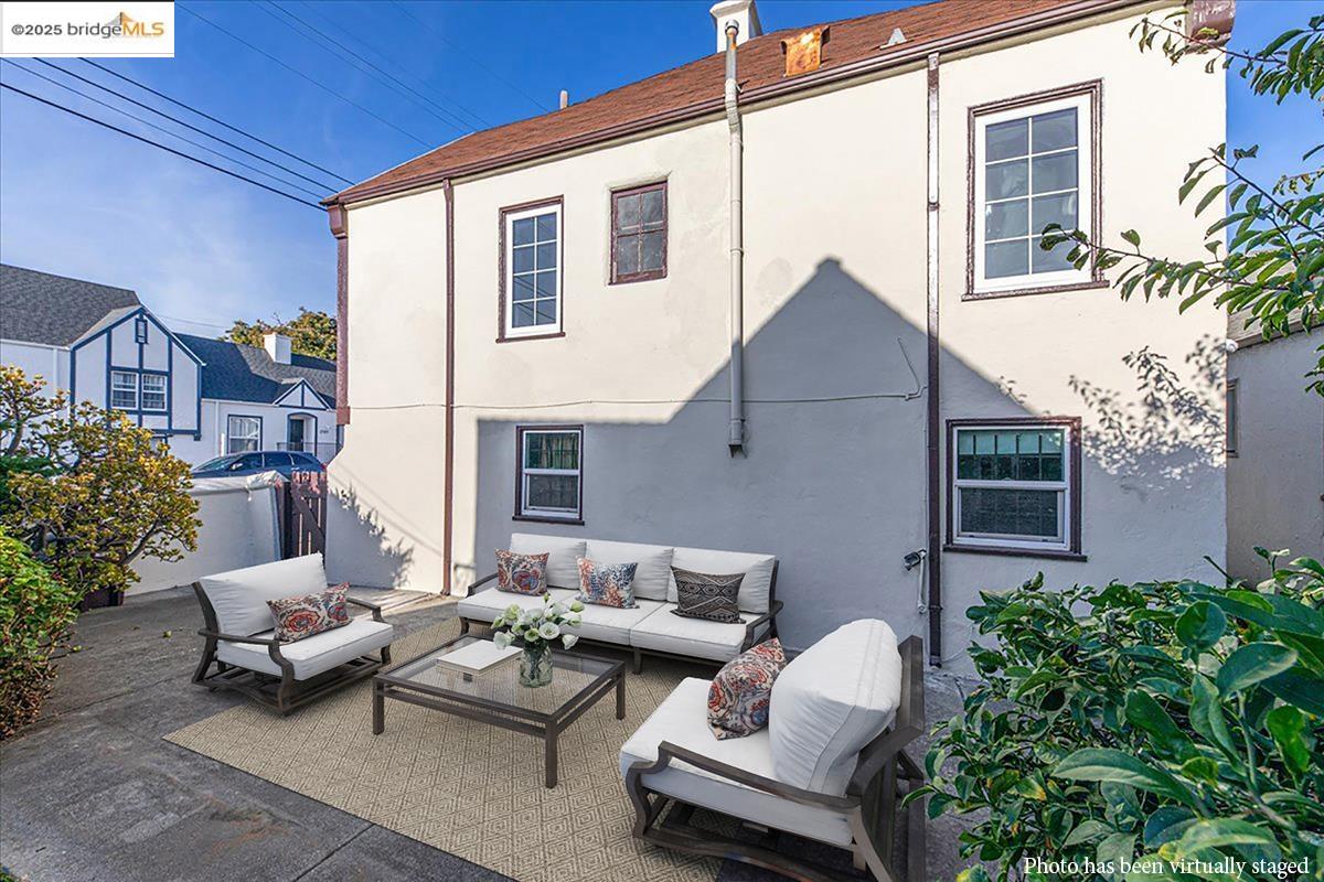 7601 Holly Street Oakland, CA 94621 - Photo 48 of 51 a building outdoor space with patio furniture
