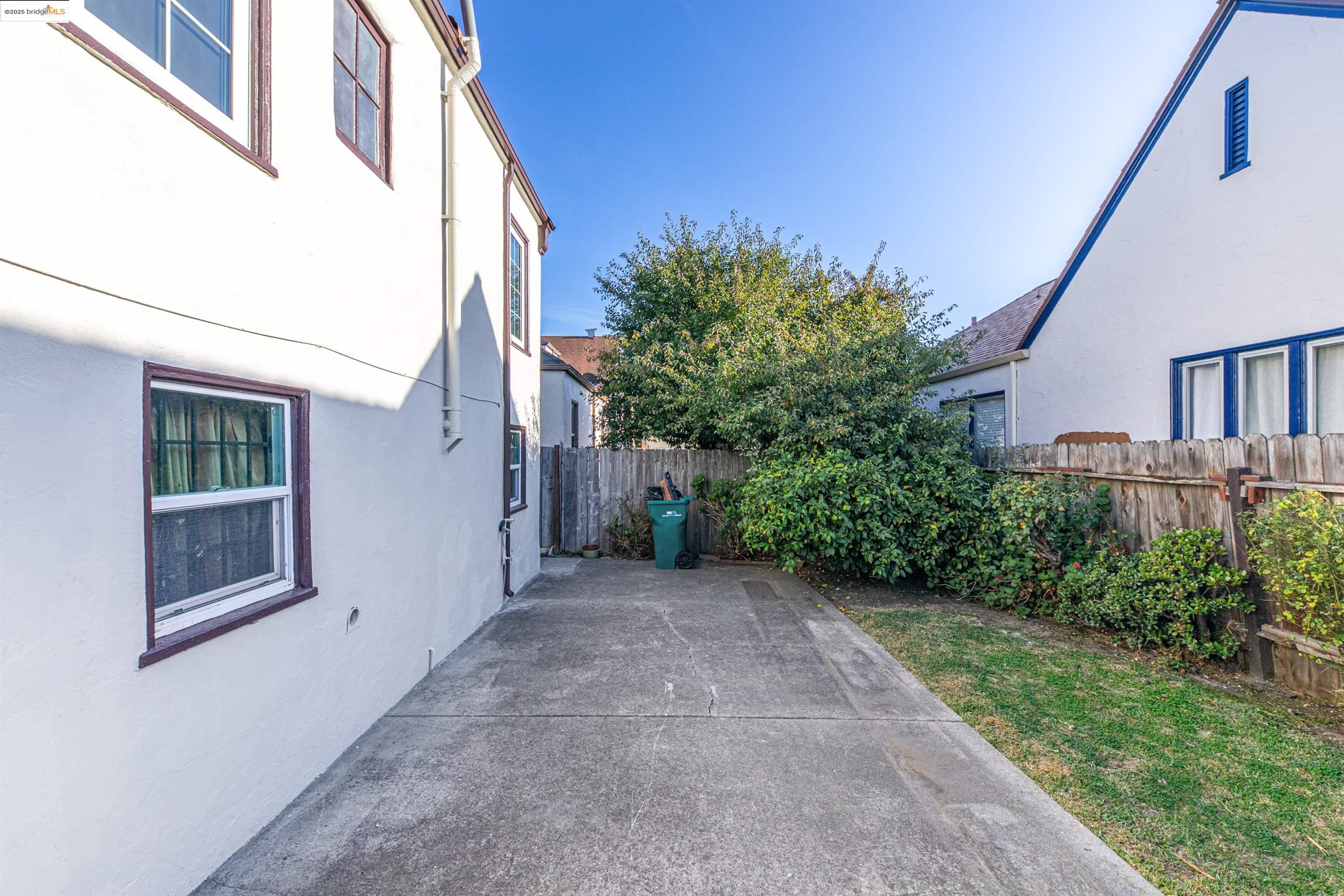 7601 Holly Street Oakland, CA 94621 - Photo 49 of 51 a view of a house with a yard