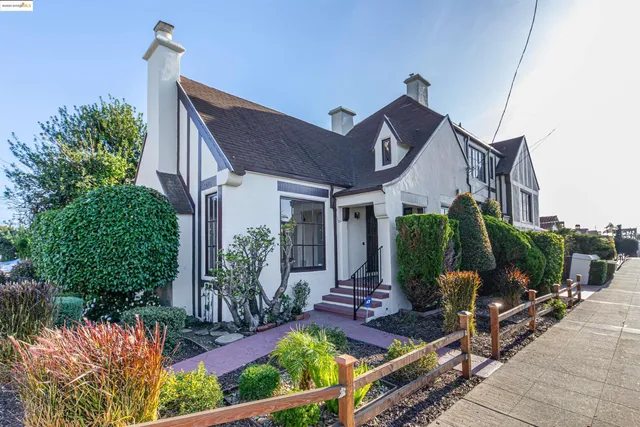 a front view of a house having yard