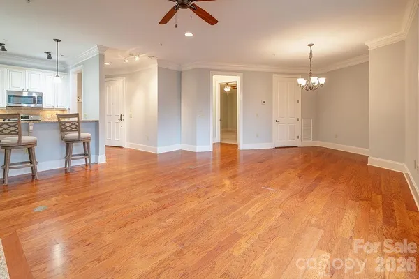 an empty room with a closet and racks