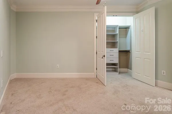 a bathroom with a bath tub with a shower