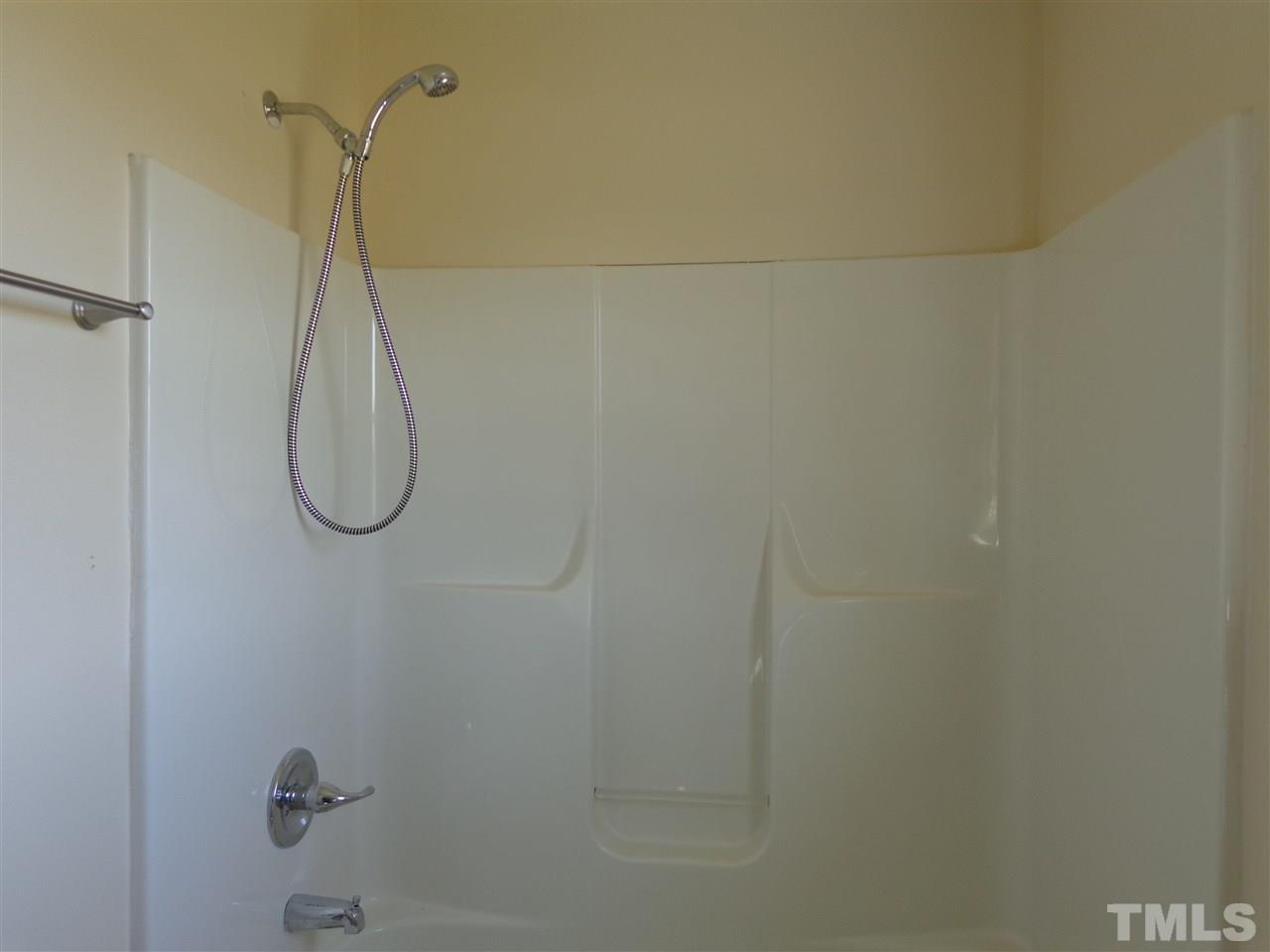 5310 Fairground Road Dunn, NC 28334 - Photo 11 of 13 a bathroom with a shower