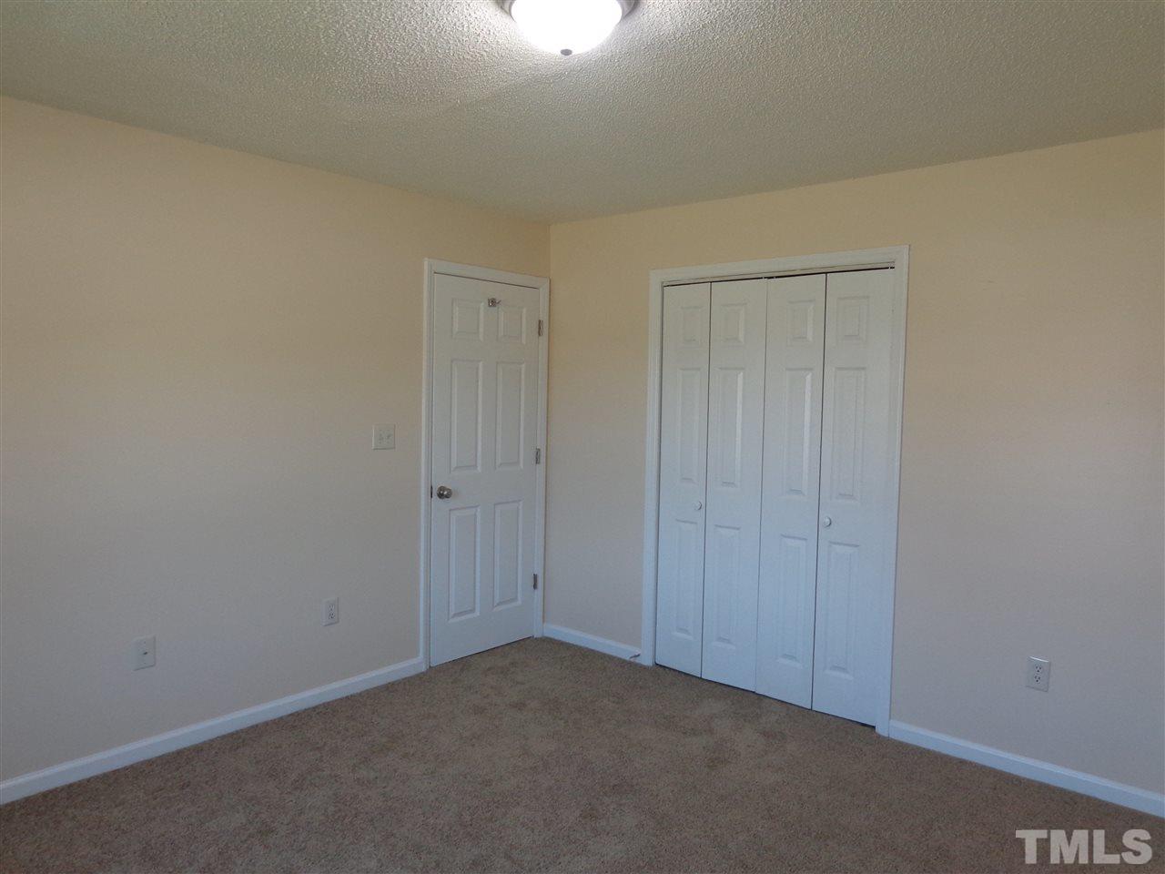 5310 Fairground Road Dunn, NC 28334 - Photo 7 of 13 a view of an empty room