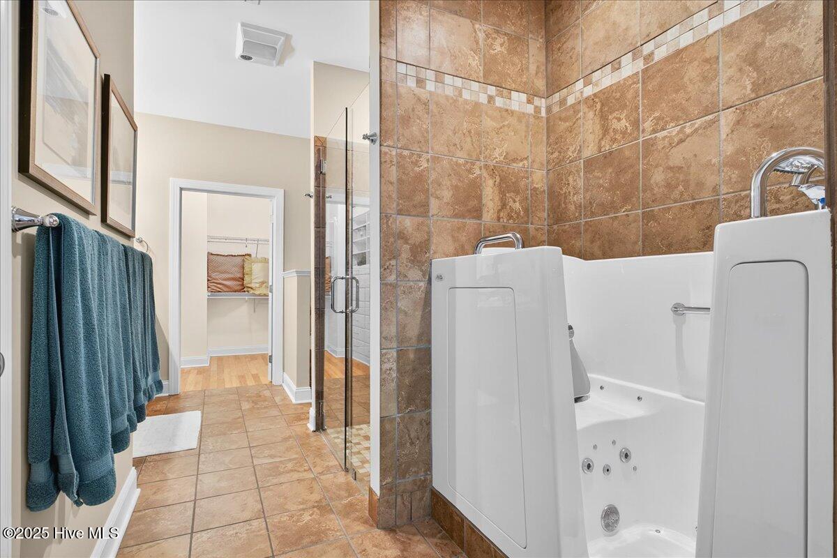 4173 Cambridge Cove Road, Unit 2 Southport, NC 28461 - Photo 31 of 66 En suite primary bath