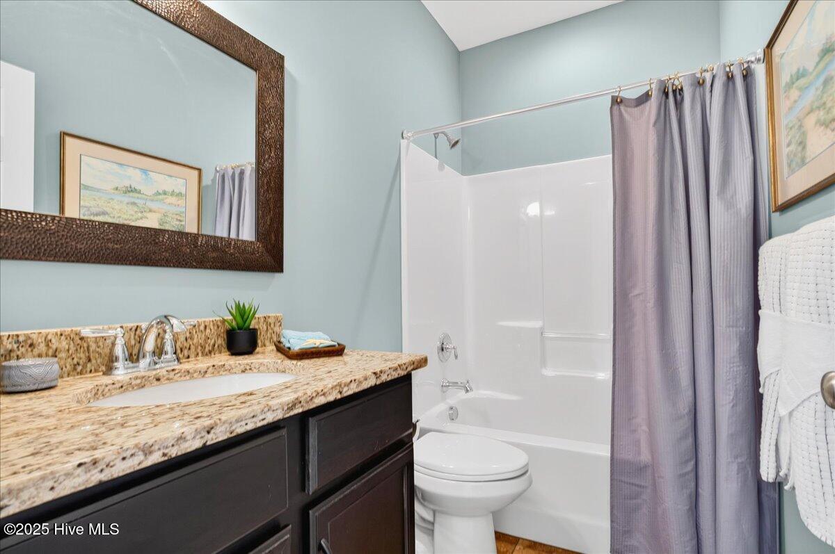 4173 Cambridge Cove Road, Unit 2 Southport, NC 28461 - Photo 40 of 66 Full secondary bath with shower/tub combo