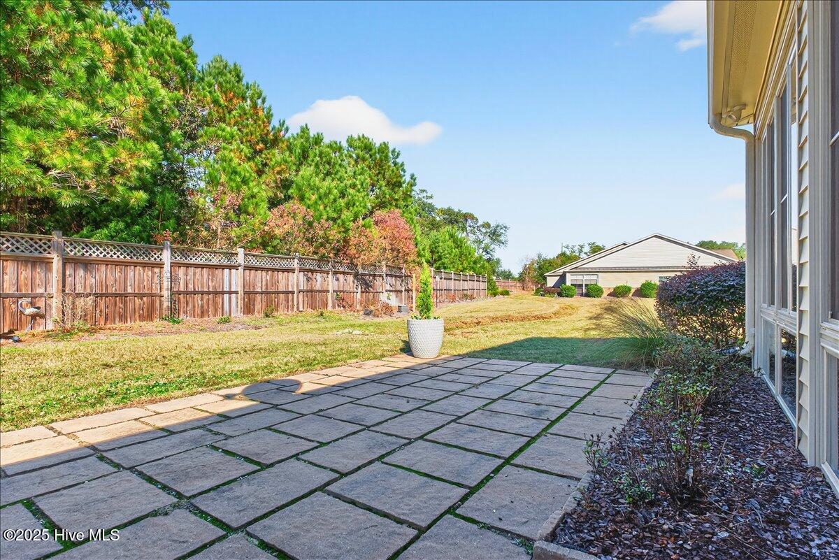 4173 Cambridge Cove Road, Unit 2 Southport, NC 28461 - Photo 46 of 66 Backyard with patio