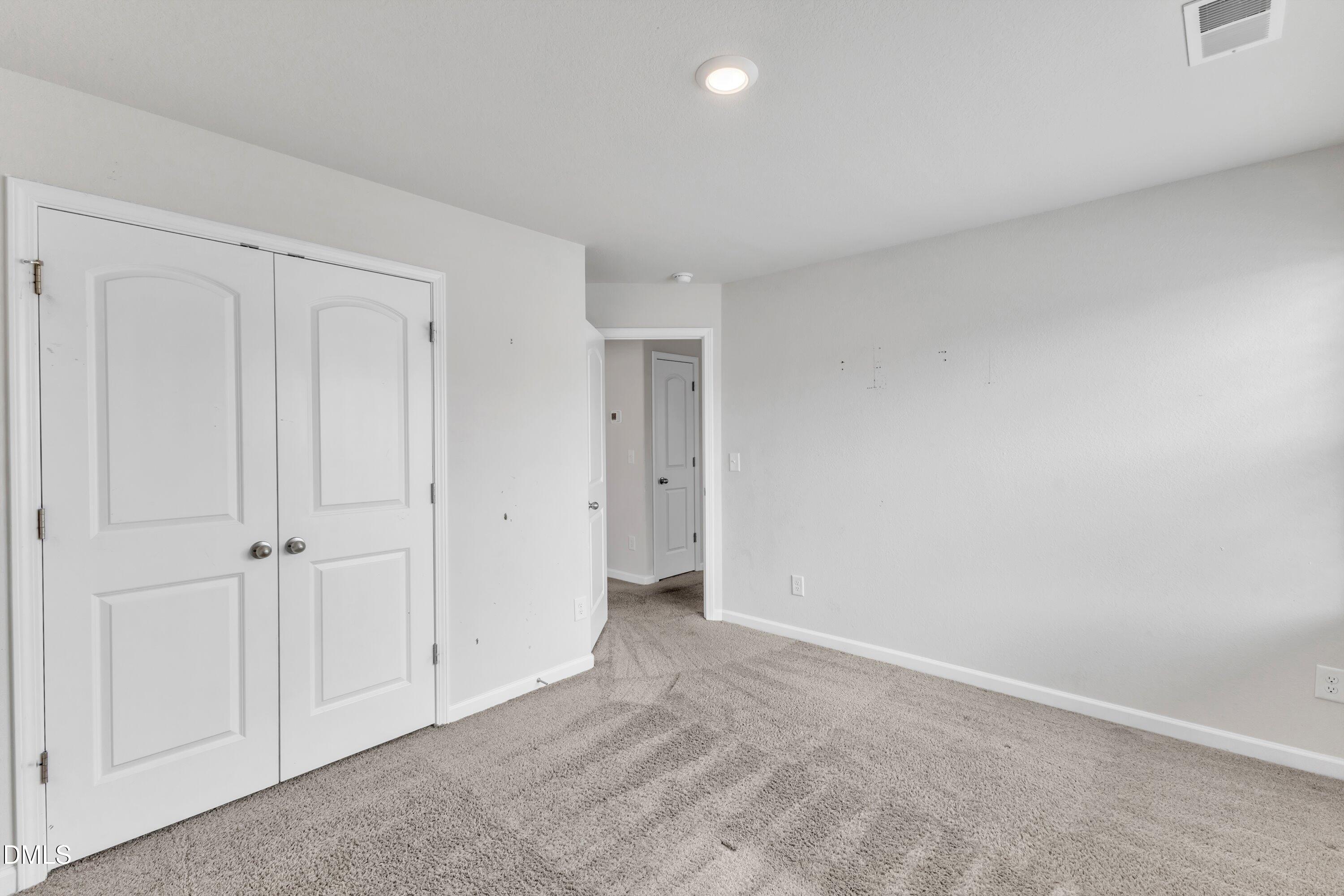 717 Little Patch Street Zebulon, NC 27597 - Photo 33 of 36 a view of an empty room