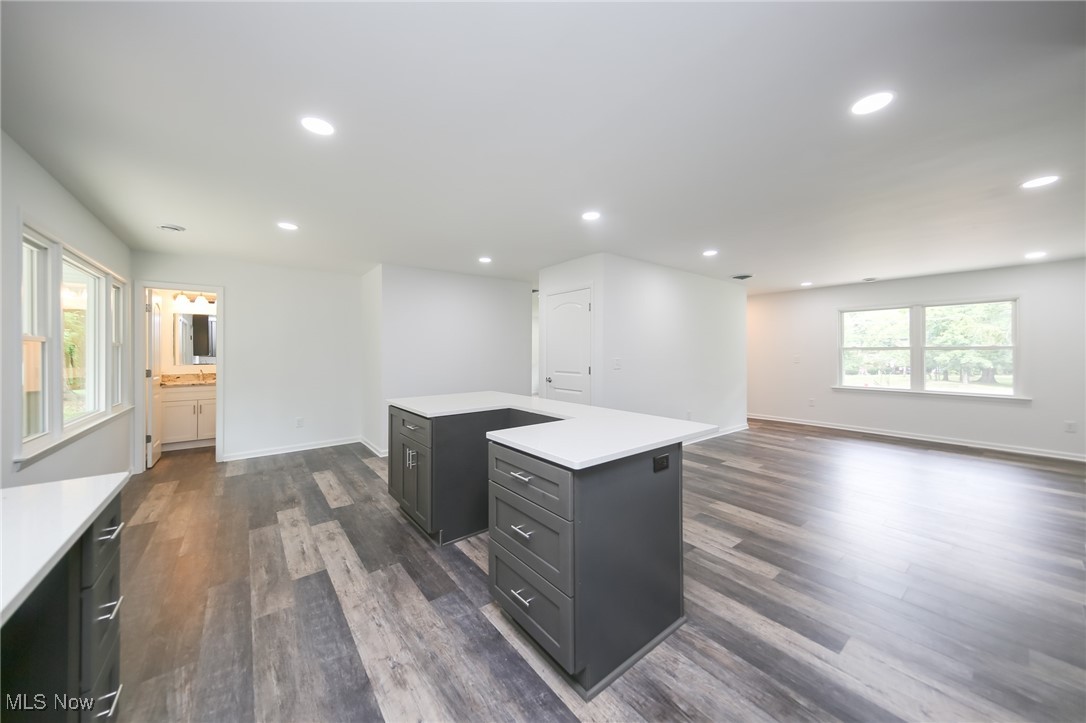 6544 Neff Road Valley City, OH 44280 - Photo 11 of 45 Kitchen with dark hardwood / wood-style floors and a kitchen island