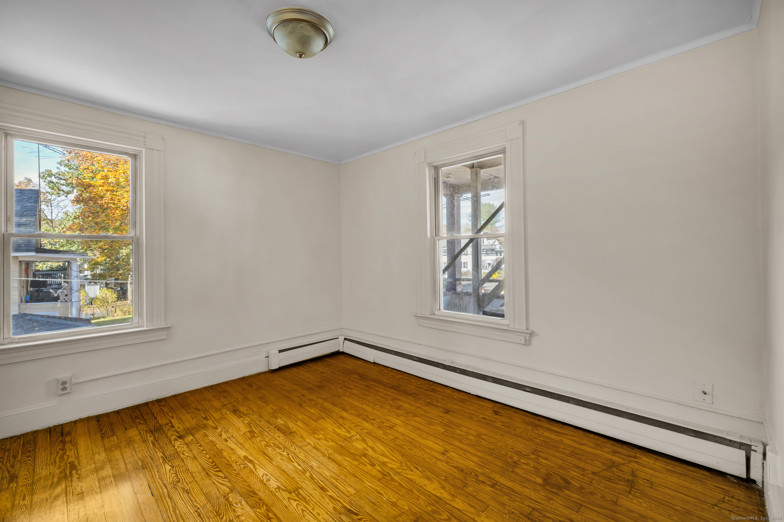 31 Wolcott Avenue, Unit 2 Torrington, CT 06790 - Photo 13 of 22 an empty room with a window