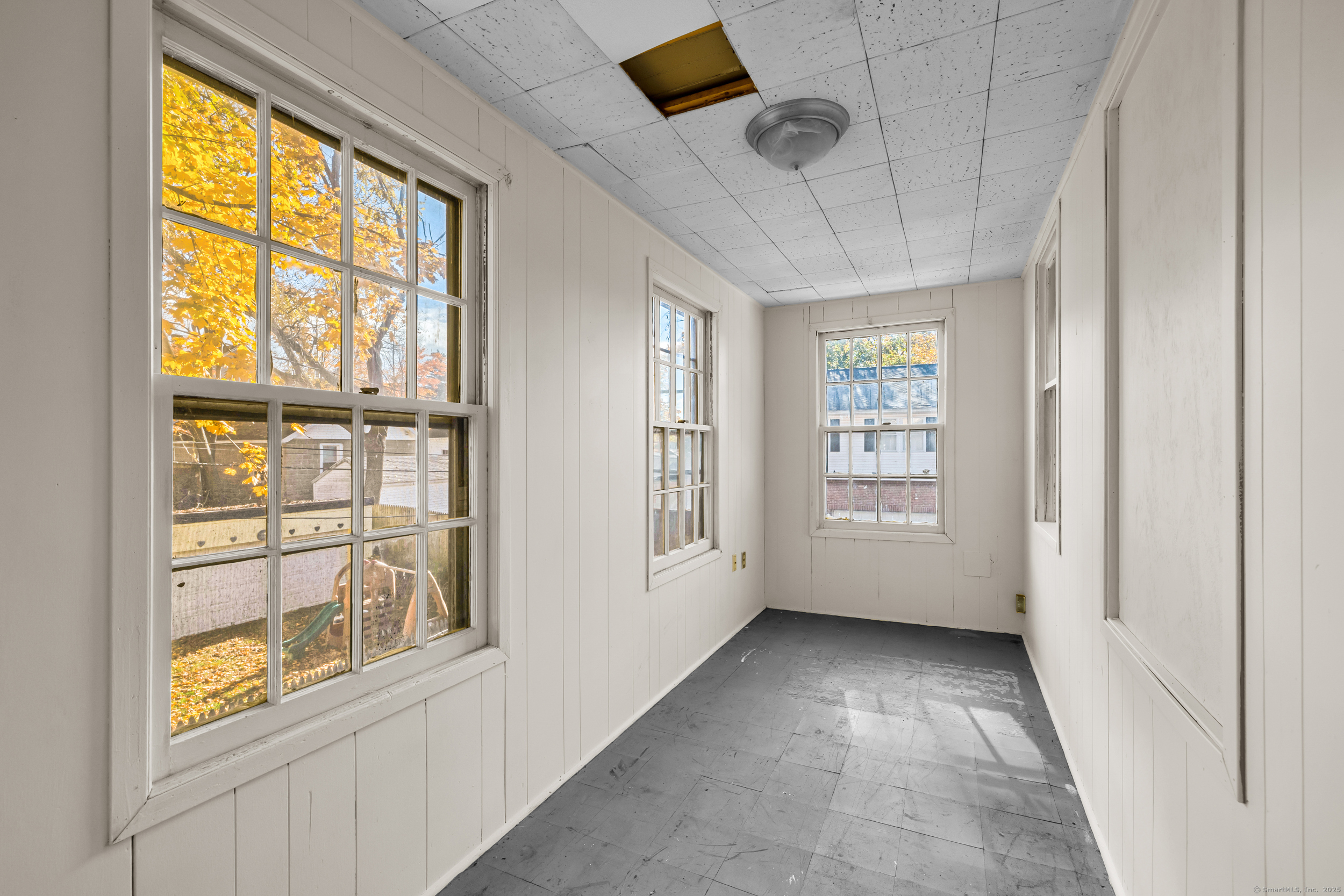 31 Wolcott Avenue, Unit 2 Torrington, CT 06790 - Photo 17 of 22 a view of an empty room with a window