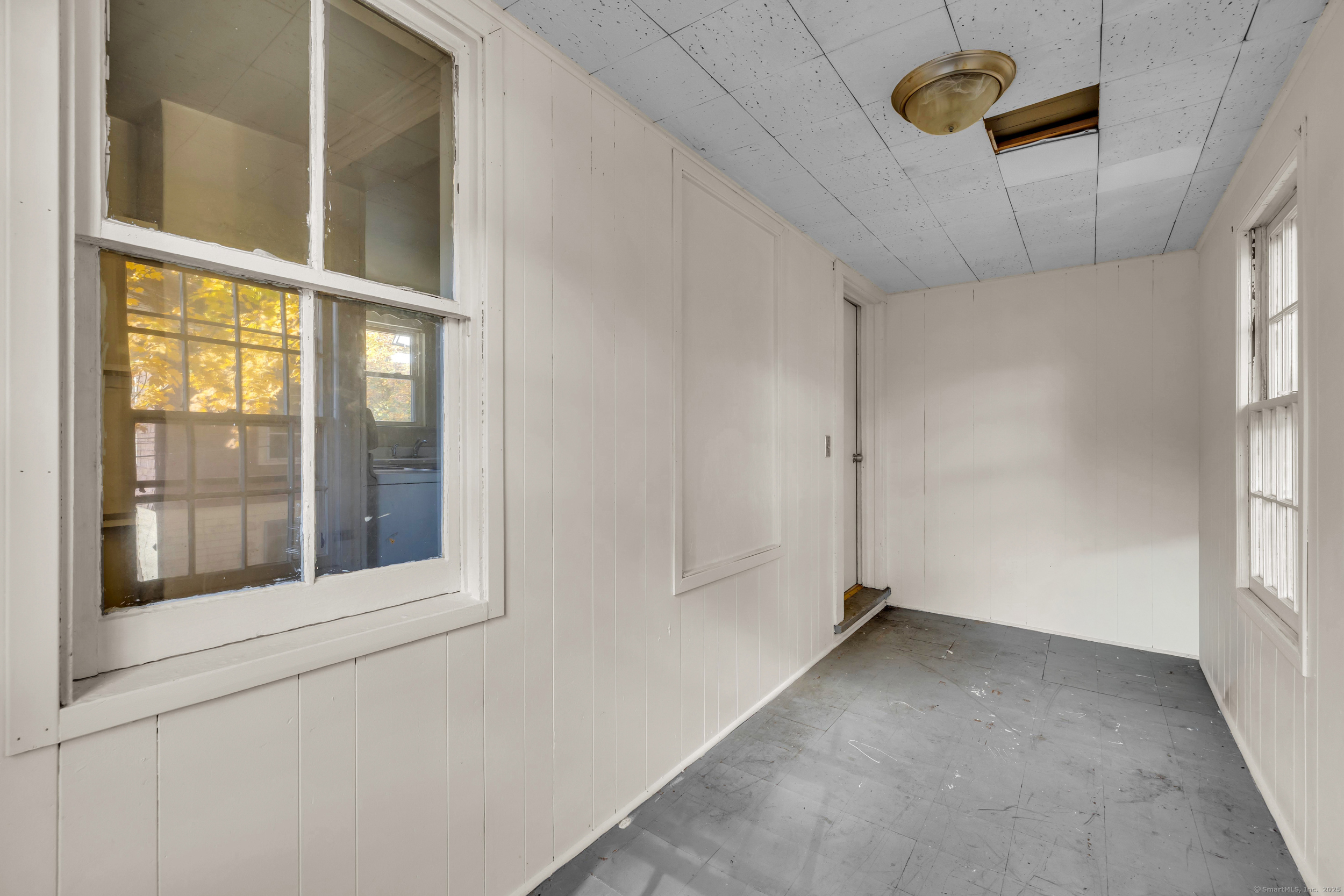 31 Wolcott Avenue, Unit 2 Torrington, CT 06790 - Photo 18 of 22 a view of empty room with windows