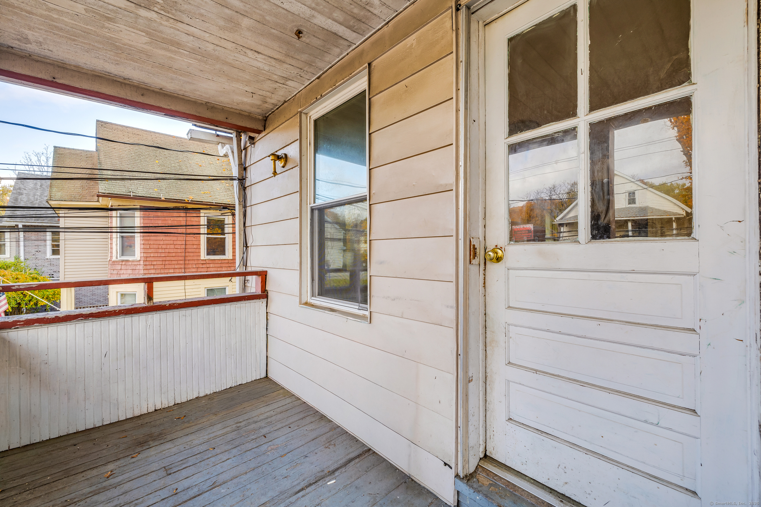 31 Wolcott Avenue, Unit 2 Torrington, CT 06790 - Photo 19 of 22 a view of a balcony on the house