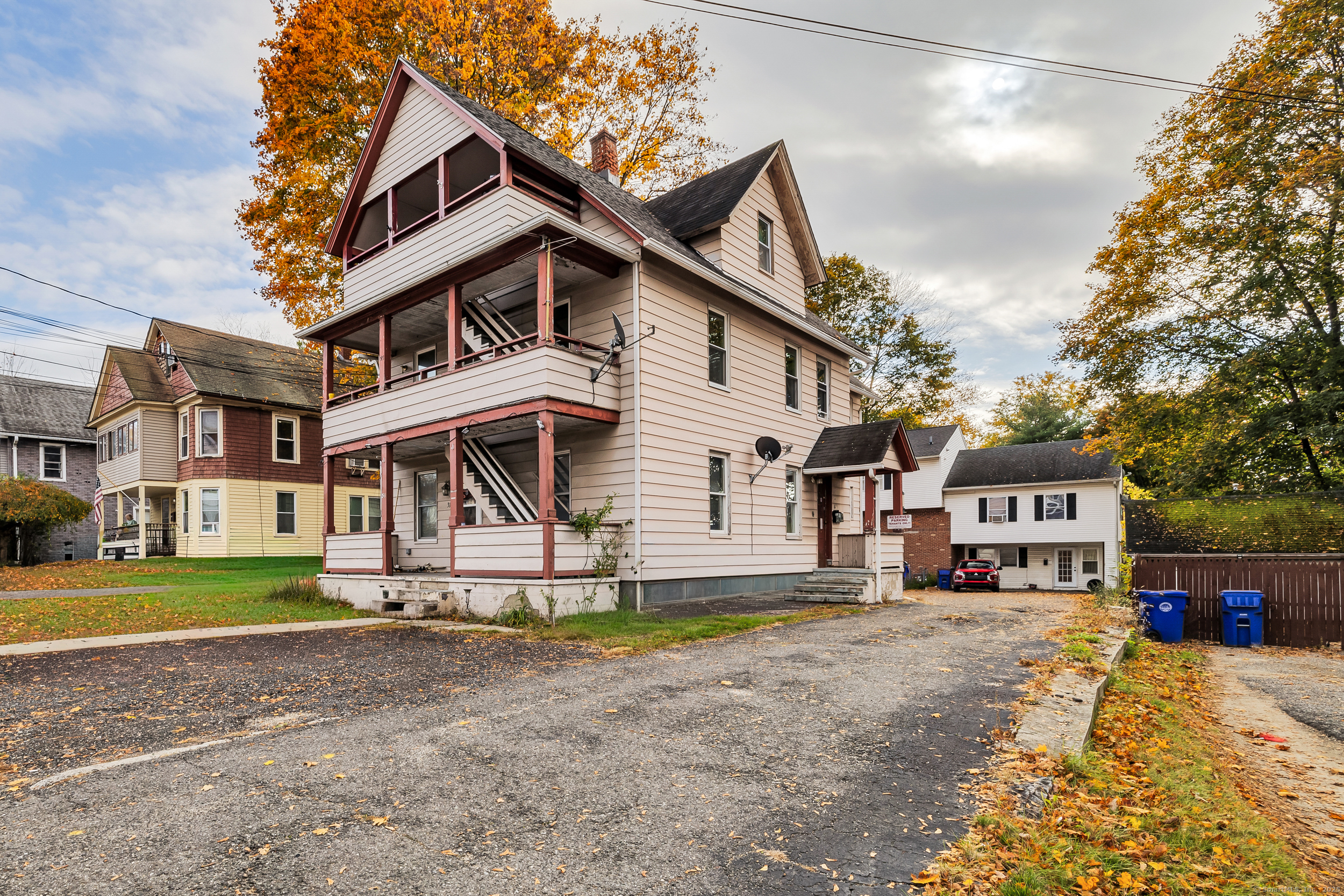 31 Wolcott Avenue, Unit 2 Torrington, CT 06790 - Photo 22 of 22 a front view of a house with a yard