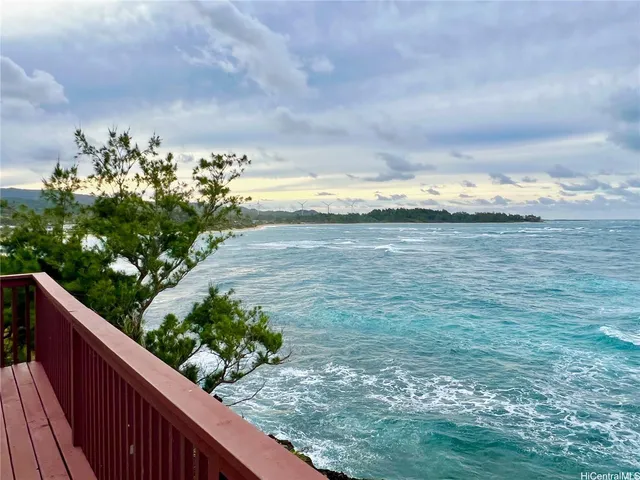 a view of a lake with a yard