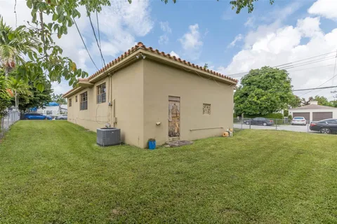 a house view with a garden space