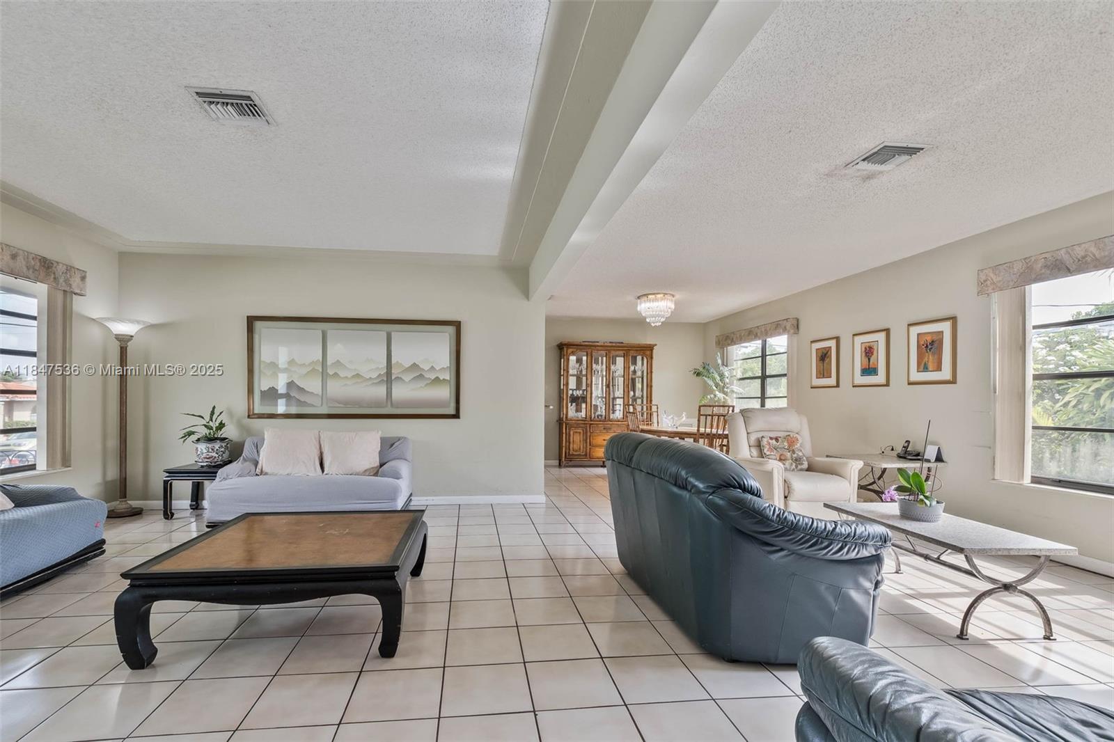 1621 Southwest 23rd Avenue Miami, FL 33145 - Photo 7 of 25 a living room with furniture rug and window