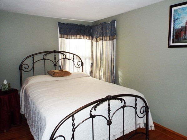 219 Prospect Street Ashland, MA 01721 - Photo 13 of 21 a bedroom with a bed and a window
