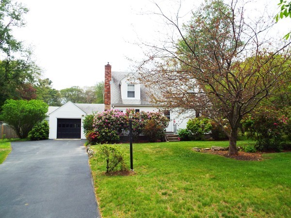 219 Prospect Street Ashland, MA 01721 - Photo 19 of 21 a front view of house with yard and green space