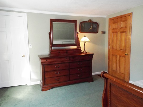 219 Prospect Street Ashland, MA 01721 - Photo 10 of 21 a room with a dresser and a window