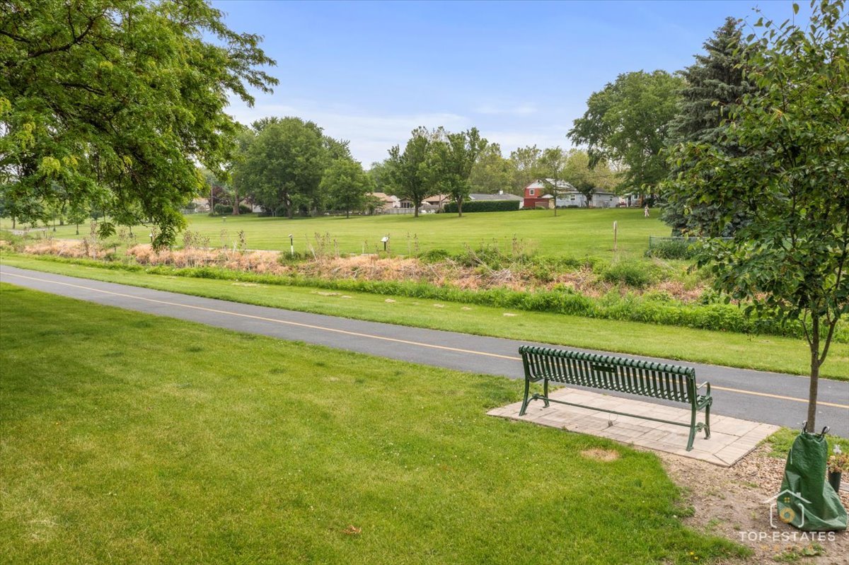 3604 Owl Drive Rolling Meadows, IL 60008 - Photo 34 of 43 a view of a garden with an outdoor space and seating area