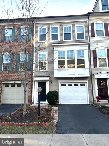 a view of a brick building with many windows
