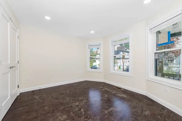 an empty room with windows