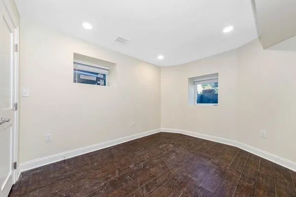 an empty room with a workspace