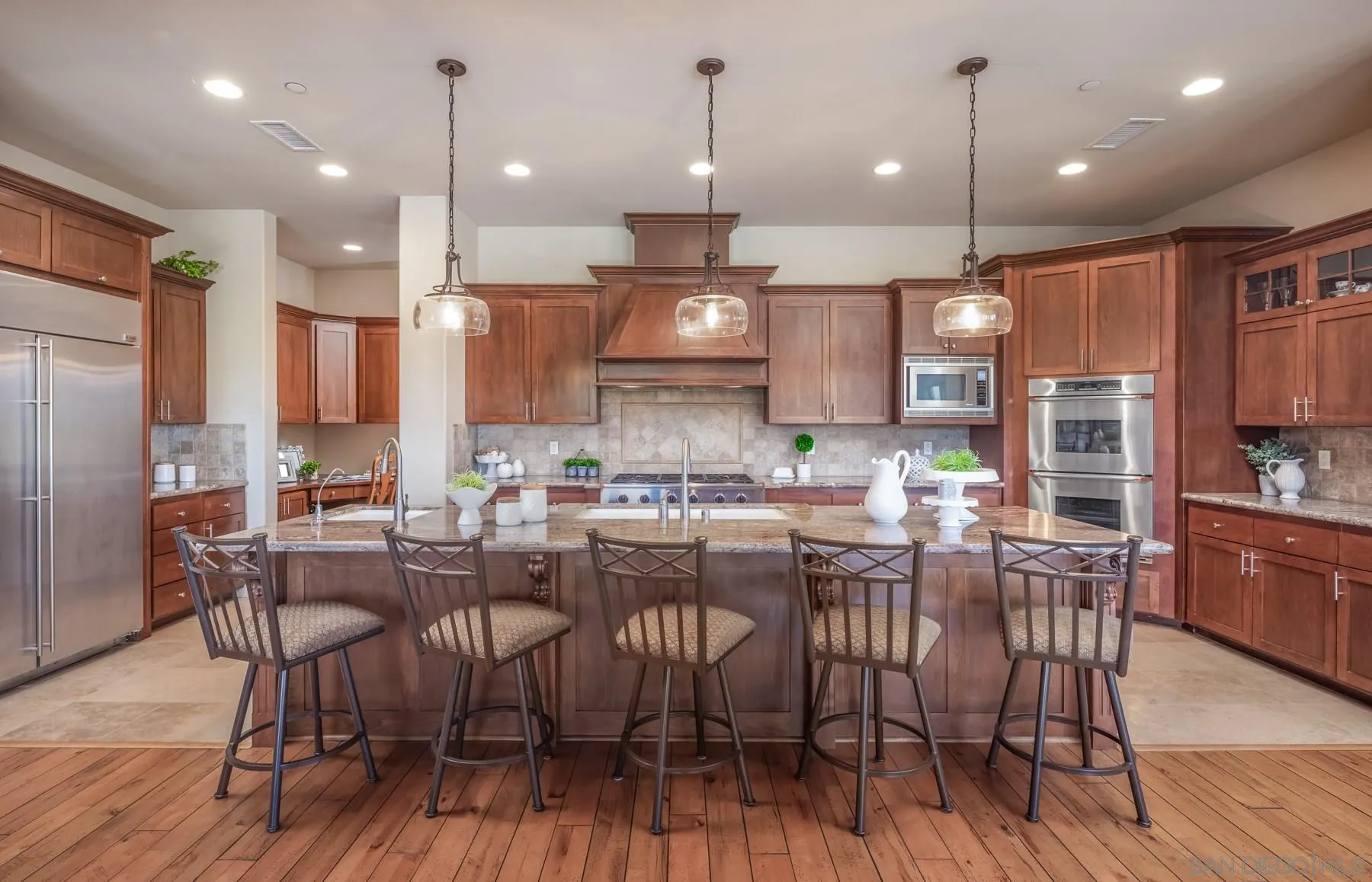 13445 Highlands Ranch Road Poway, CA 92064 - Photo 6 of 29 a view of a dining room with furniture kitchen and wooden floor